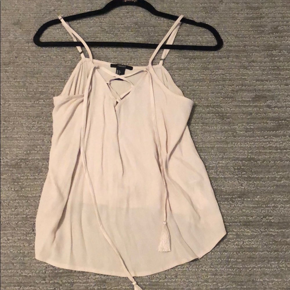 Tan tank top with cross cross chest